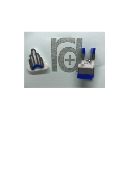 Shown on a small light blue card is a 3D Printed pin next to a set of cufflinks. The pin has a white cloud with a silver and blue art deco arch in front.  This arch is a prominent landmark in the Sunnyside neighborhood in Queens, NY. The cufflinks are squares that have the same white, blue, and silver colors  of the arch in horizontal stripes. 
