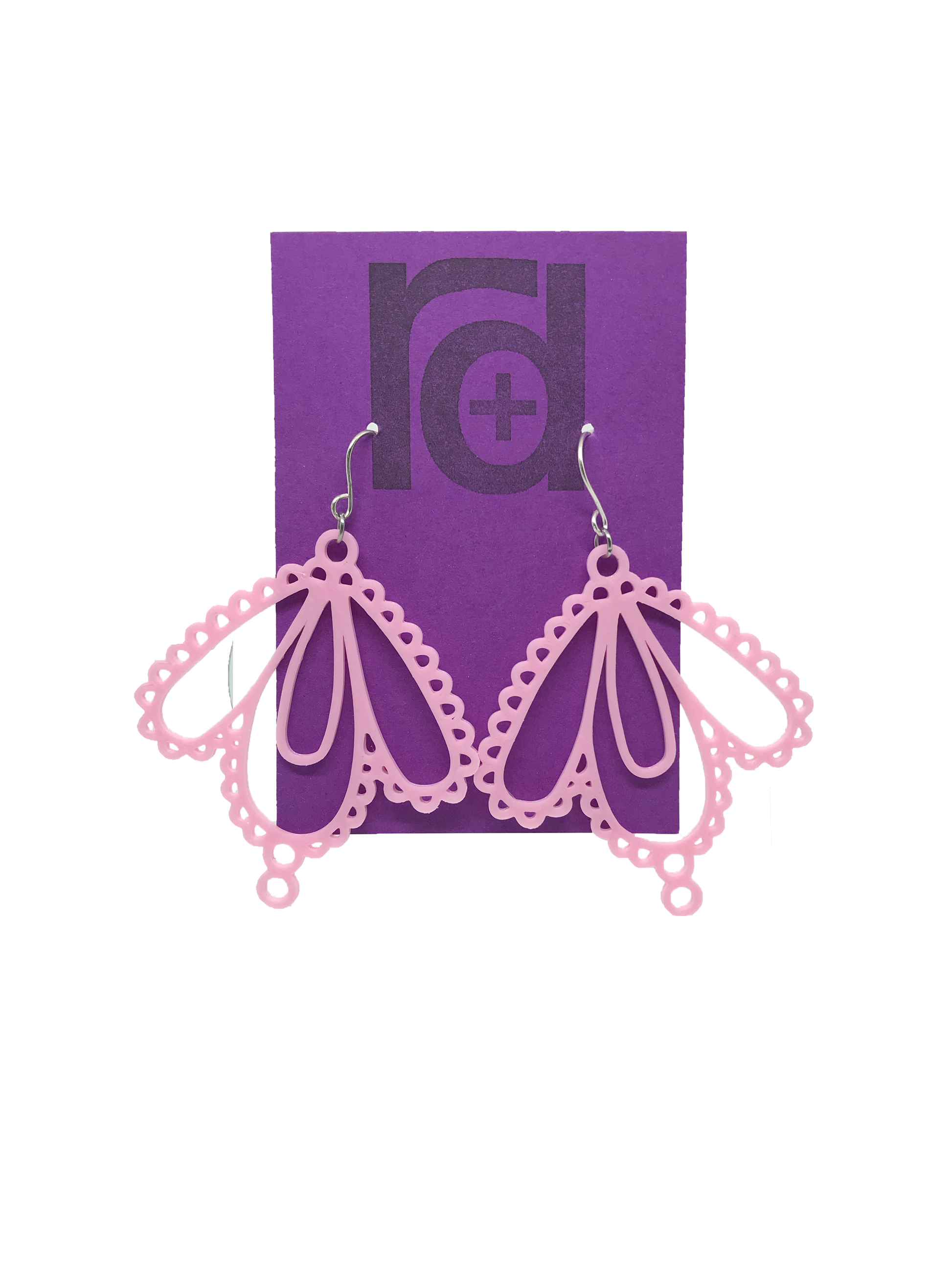 Two earrings on a purple earring card: they have three teardrop shapes and are reminiscent to lace. These 3D printed earrings are made with a light pink sustainable filament.