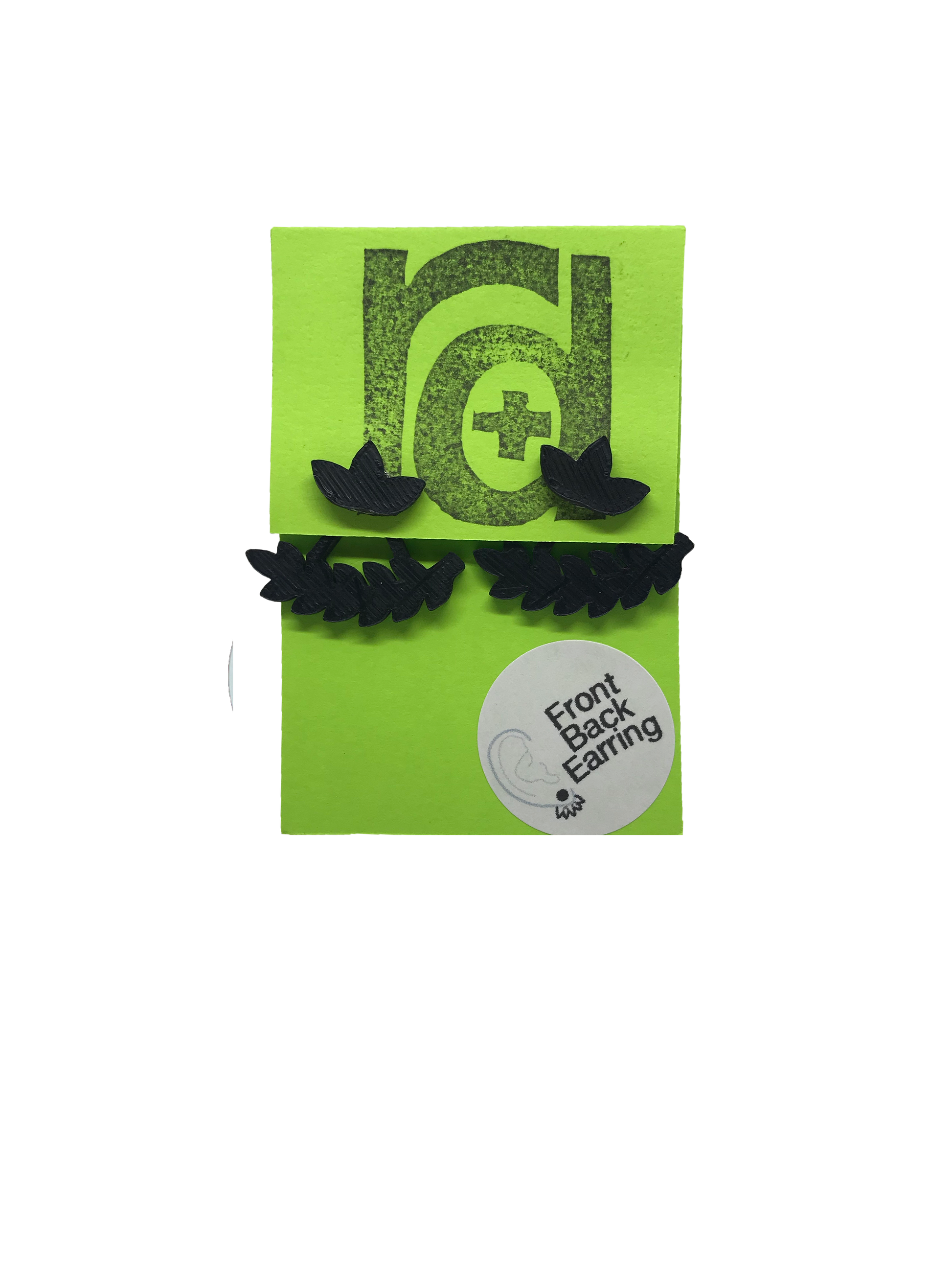 Shown on a bright green earring card are two R+D earrings. They are front back earrings (earring jackets) that have a cluster of three leaves on the stud. The piece that fits behind the ear is a leafy bough or vine that curves with the shape of one's earlobe. These eco friendly 3D printed studs are shown in black.