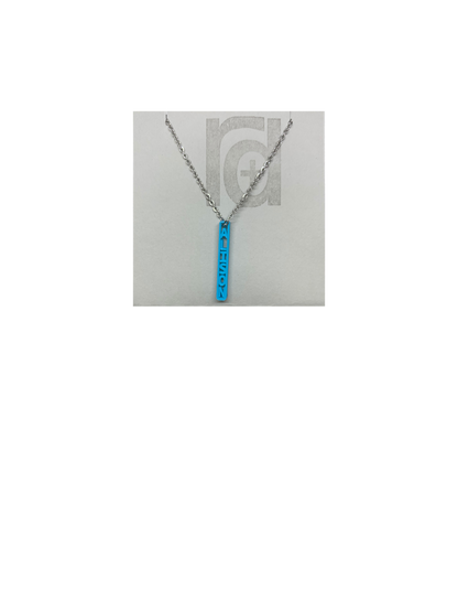 Pictured on a grey card is a R+D 3D printed necklace. There is a skinny teal pendant that is turned so you can read the name ALISON.